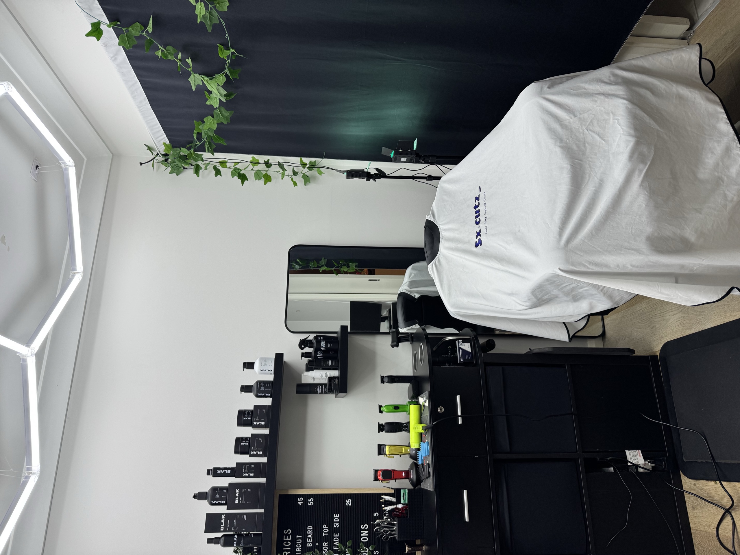 The SXcuts chair, workstation and hexagonal studio lights in St Ives